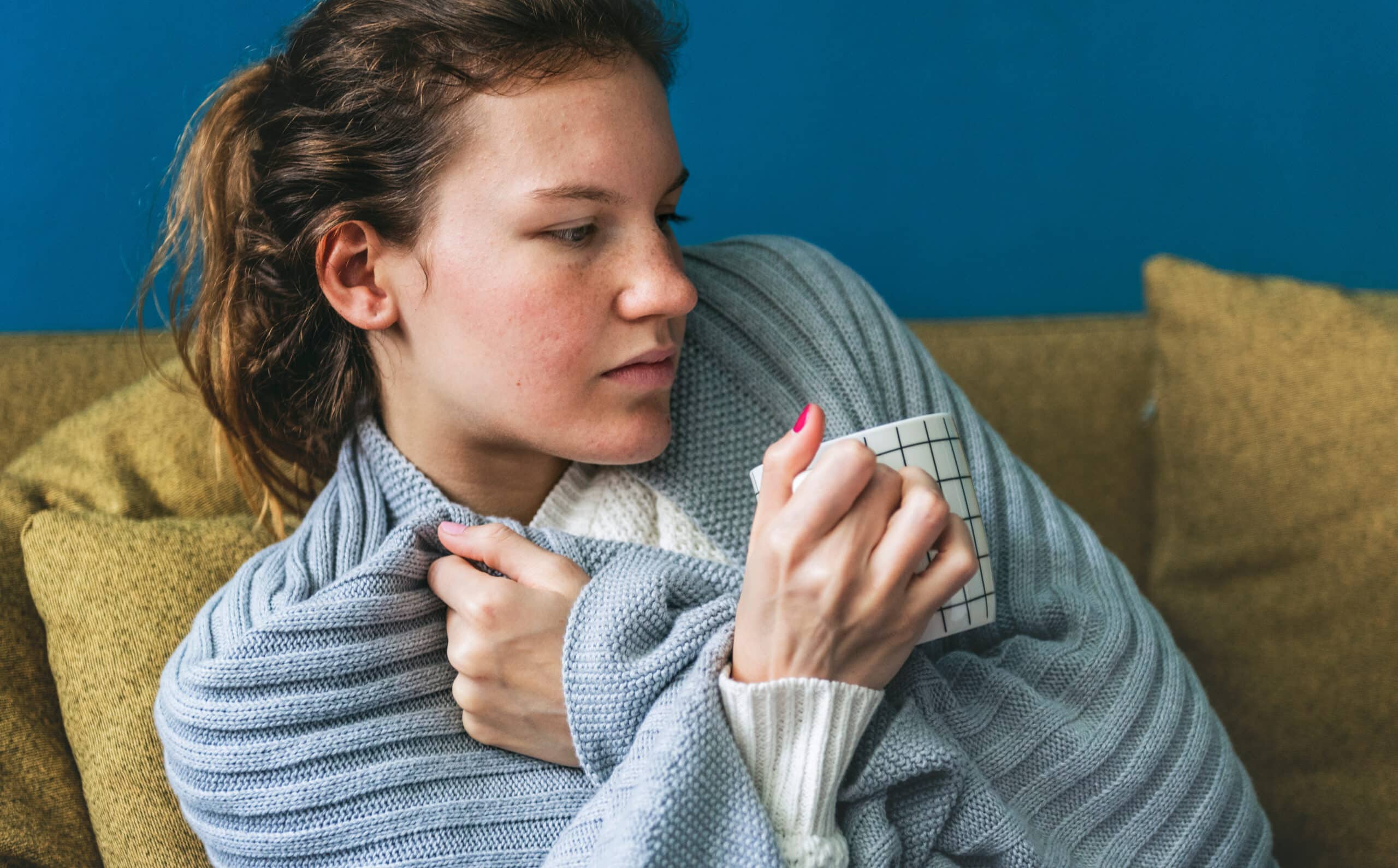 A Young Girlsick On The Sofa