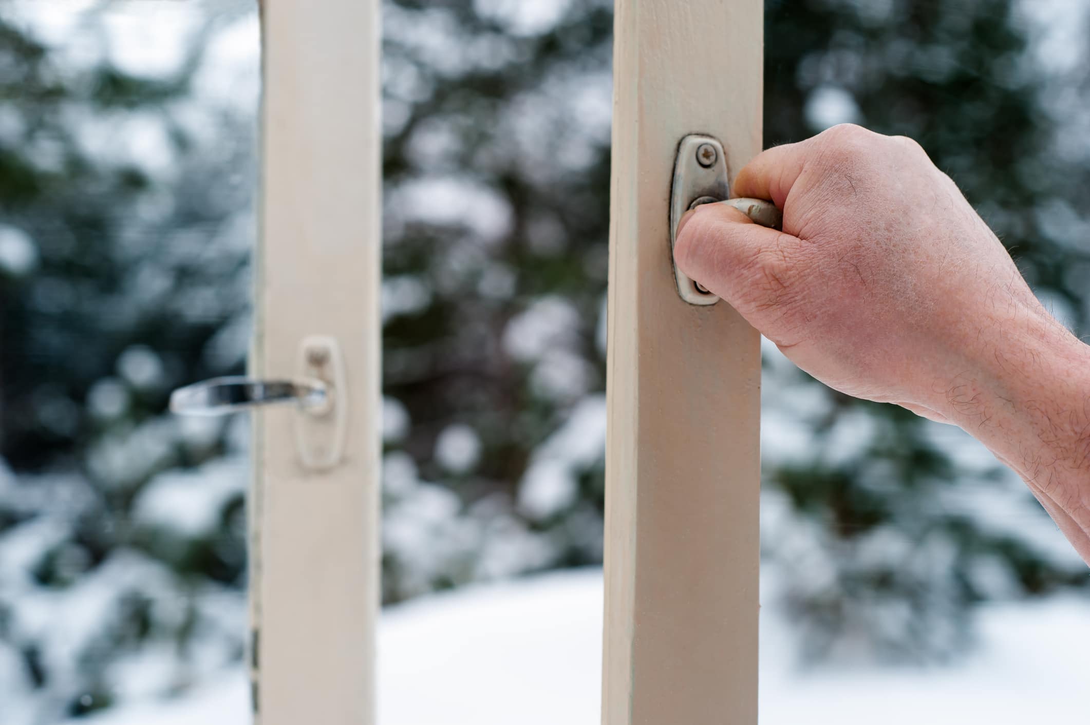 Hand Of Man Opens A Wooden Windows