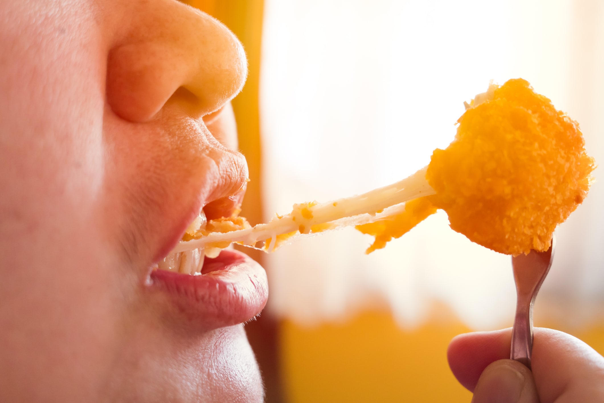 Closeup Eating Cheese Ball Deep Fried Fatty Tasty Delicious Food Snack.