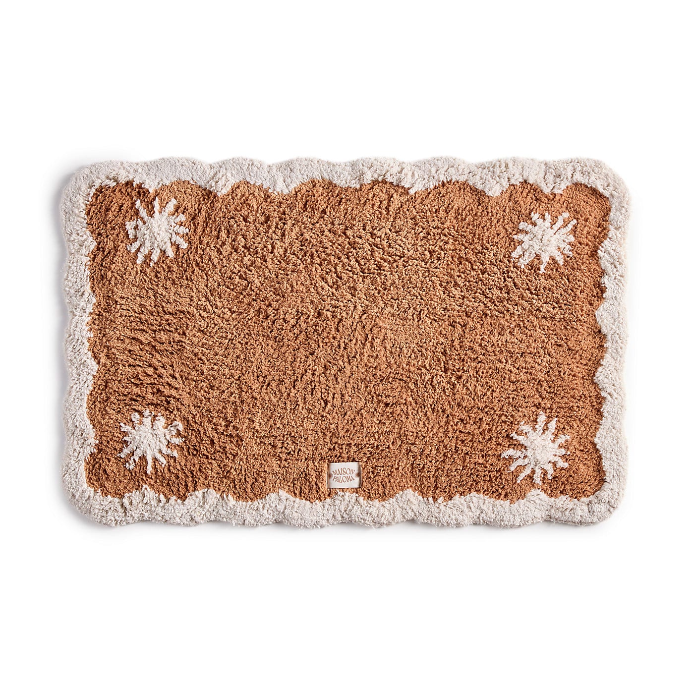Une touche bohème en coton tufté qui sublime instantanément votre carrelage