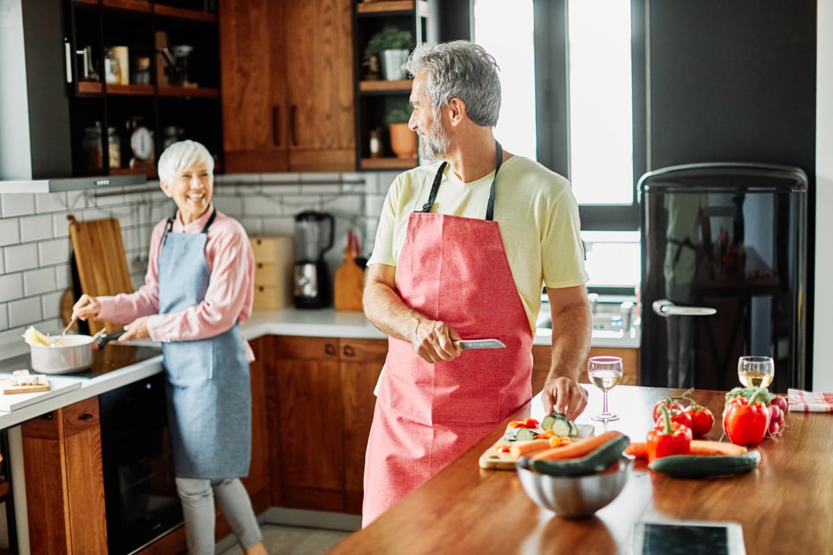 Cheerful Senior Couple Prepares Vegetables In Kitc 2026 09 22 11 36 19 Utc